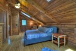 Open Loft Master Bedroom with a King Bed, flat Screen TV and a Private Open Porch